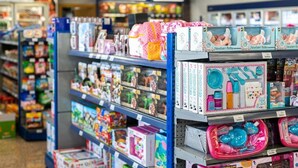 A store aisle with shelves stocked with children's toys and products. - Andamur San Roman (San Millan)