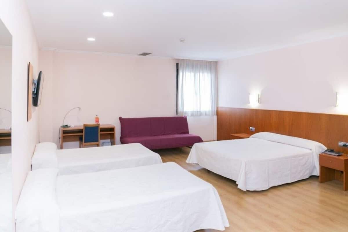 family room | desk, laptop workspace, soundproofing, free cots/infant beds