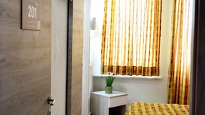Quadruple Room | Desk, blackout drapes, soundproofing, free WiFi
