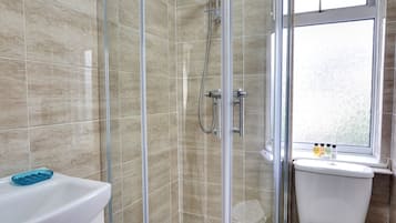 Shower, free toiletries, hair dryer, towels