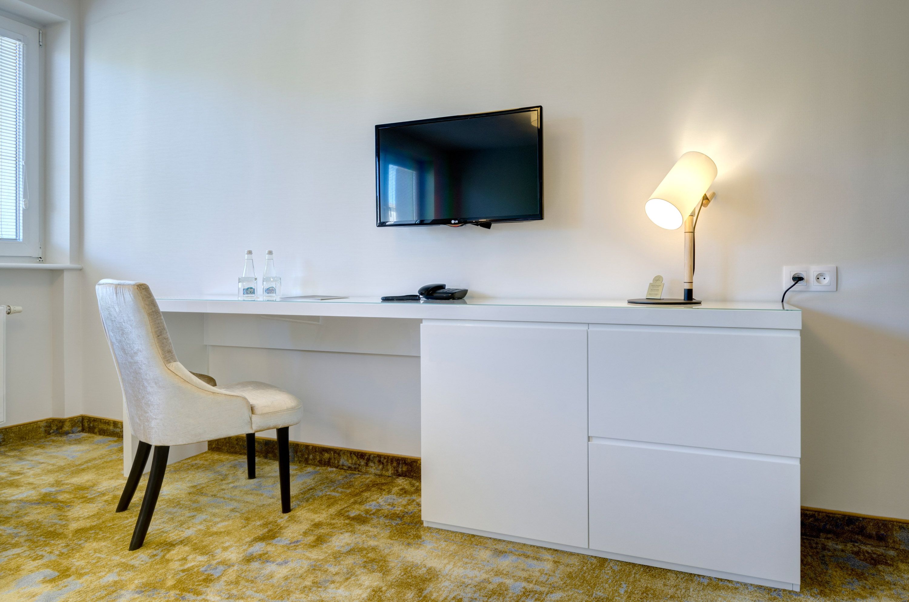 family room | in-room safe, desk, blackout curtains, iron/ironing board