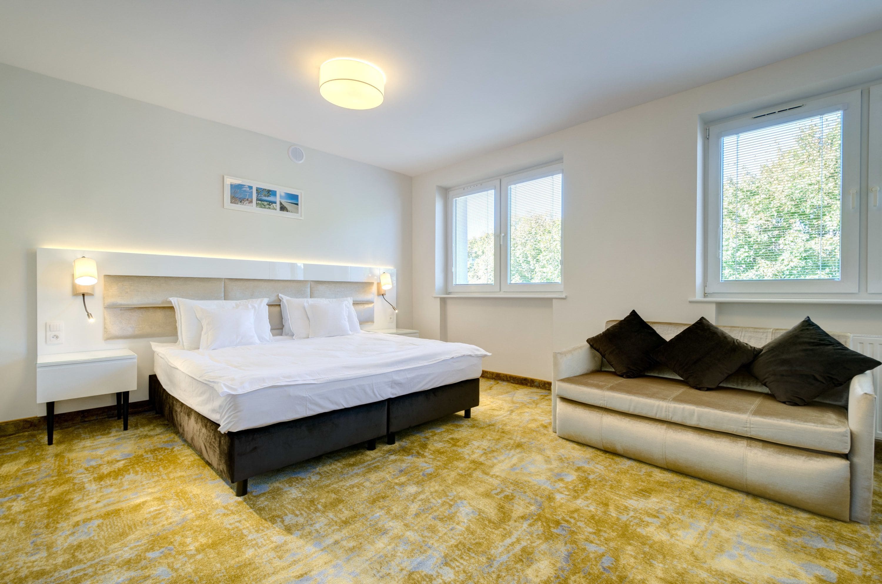 family room | in-room safe, desk, blackout curtains, iron/ironing board