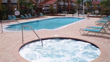 Outdoor pool, a heated pool, sun loungers