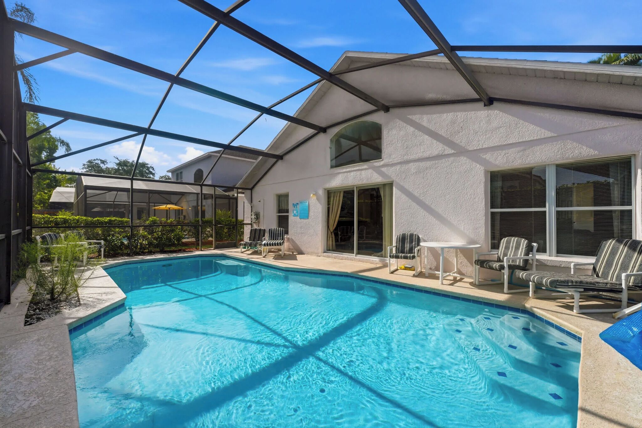 Outdoor pool, a heated pool, sun loungers