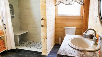 Combined shower/tub, jetted tub, hair dryer, towels
