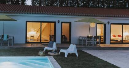 Elegant and private, with lawn out front and set back from the pool for added seclusion. Features Marshall speaker, plush robes, handmade herbal bath products and a sommelier-selected wine bottle for an exclusive stay.