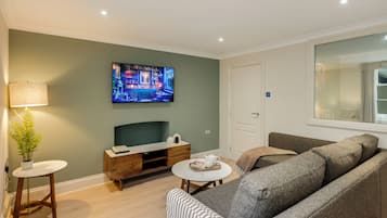 City Apartment, 3 Bedrooms | Living area | Smart TV, Netflix