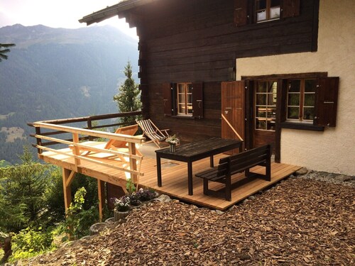 Outside: chalet for 7 people in the heights of St-Luc, terrace with garden furniture -Interior: appr