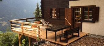 Outside: chalet for 7 people in the heights of St-Luc, terrace with garden furniture -Interior: appr