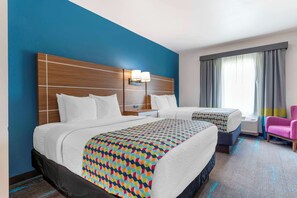 Desk, laptop workspace, iron/ironing board, cribs/infant beds