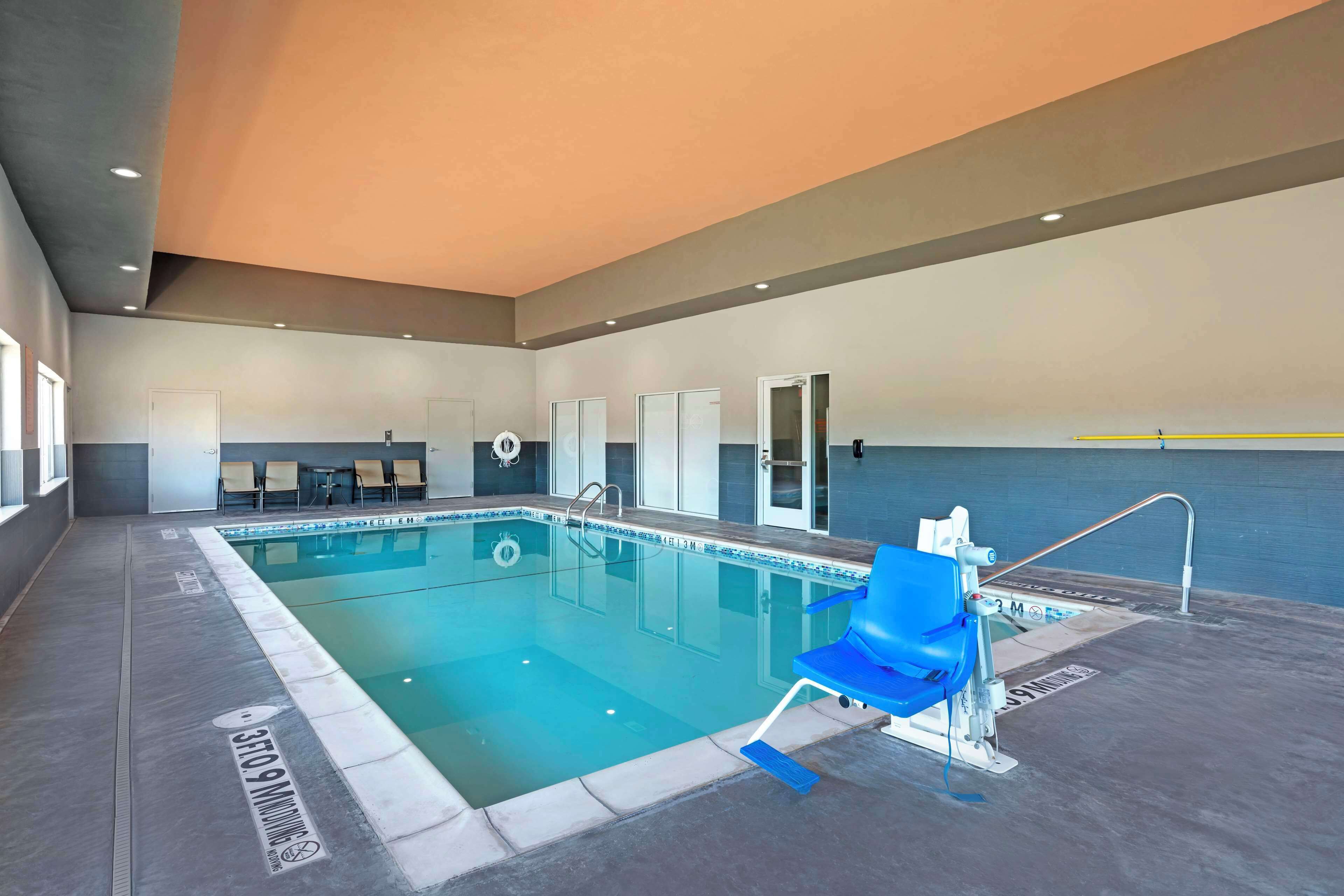 indoor pool, open 8:00 am to 10:00 pm, pool loungers