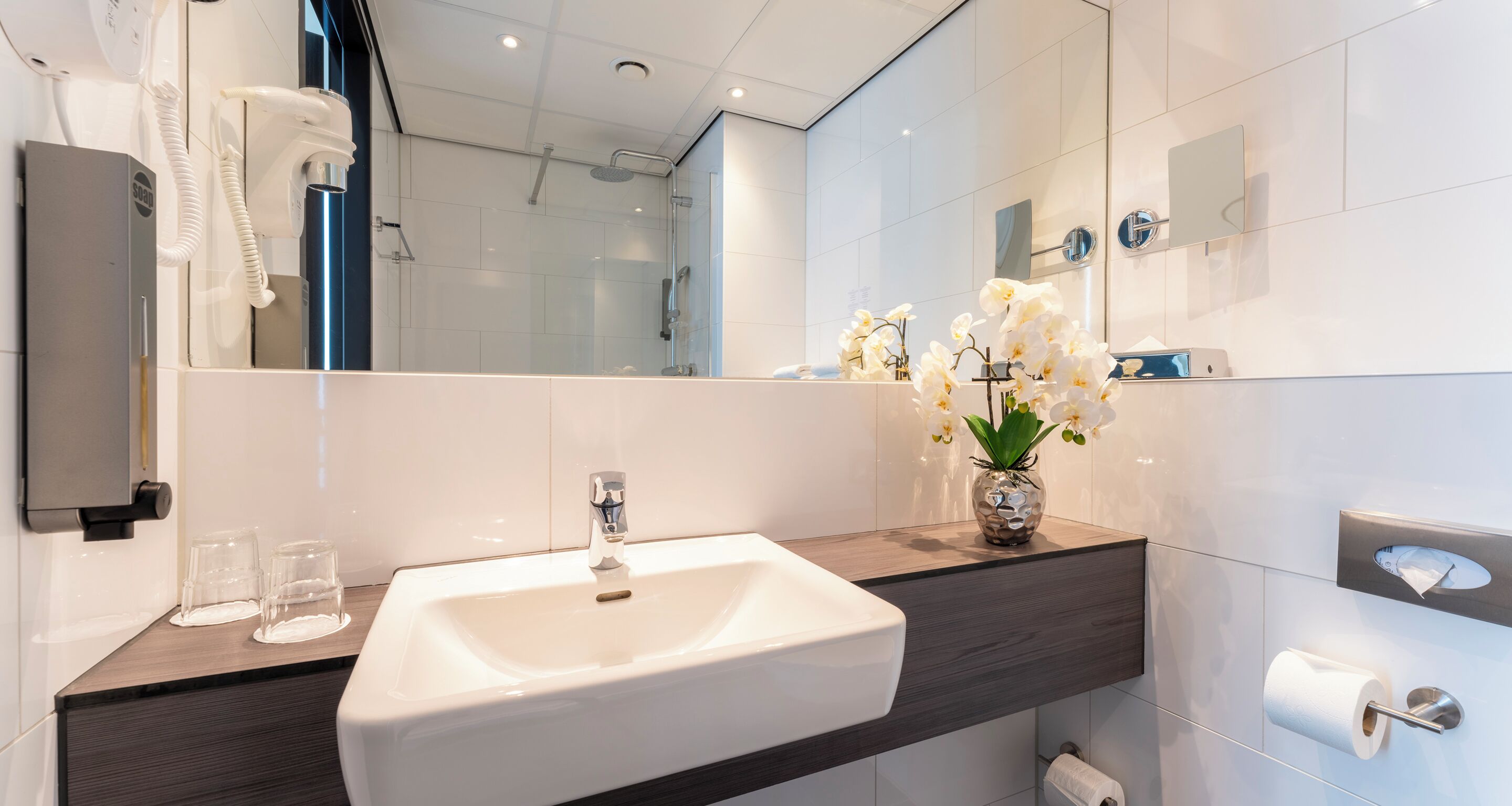 comfort apartment | bathroom | shower, rainfall showerhead, hair dryer, towels