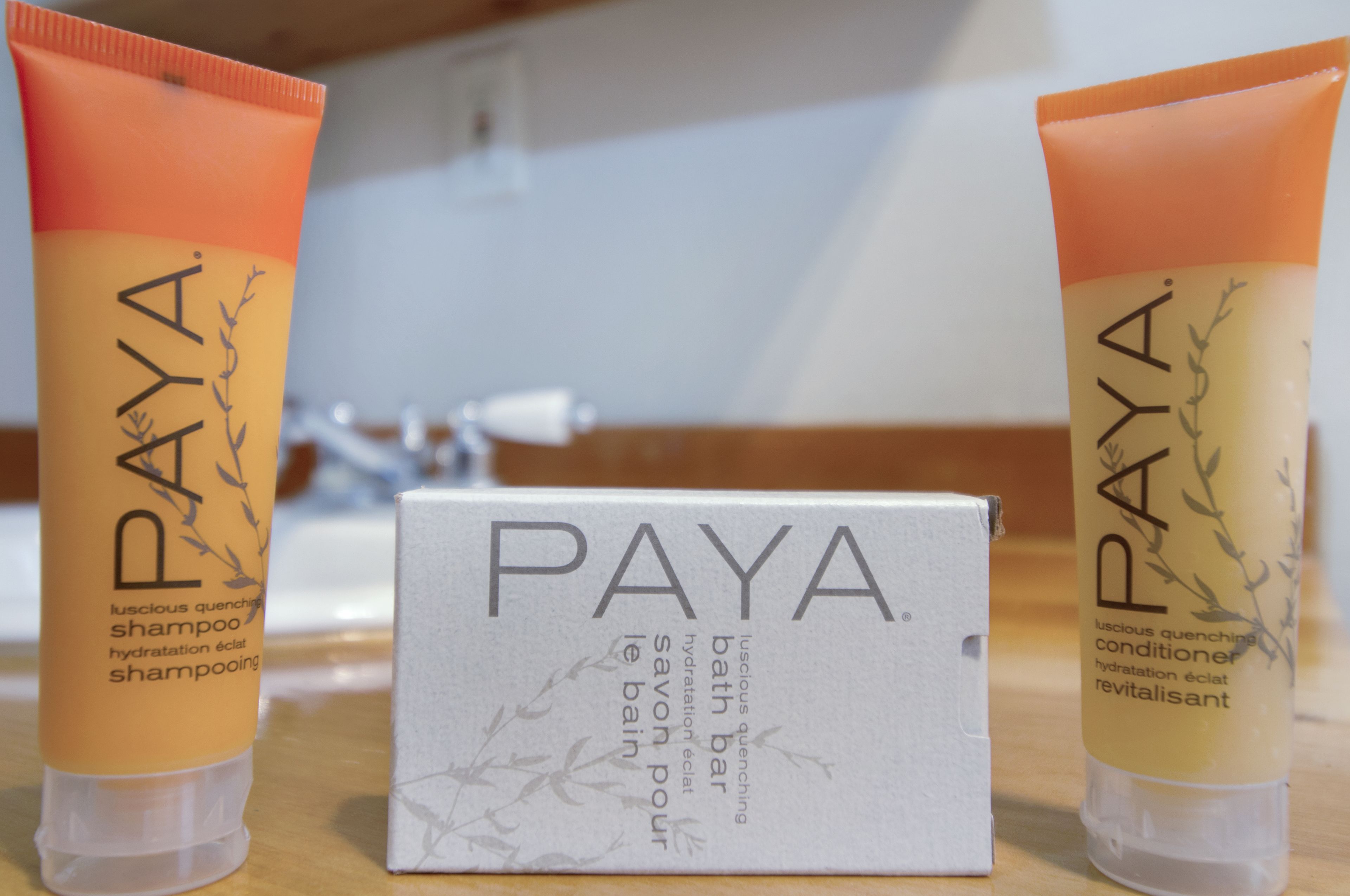 Three tubes of PAYA shampoo and conditioner, and a box of the same product.