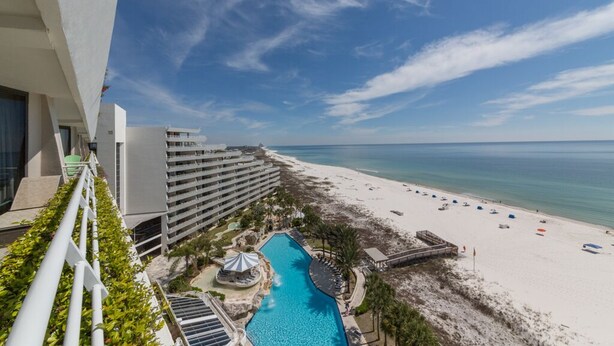 A resort with a pool, beach, and ocean view. - Eden West 905 Completely updated Gulf Front Condo with Stunning Views! (Pensacola)