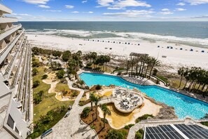 A resort with a pool, beach, and ocean view. - Updated W 700 1 Bedroom 2 Bath Gulf Front Condo with Stunning Views! (Pensacola)