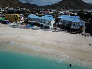 On the beach, sun loungers, beach towels