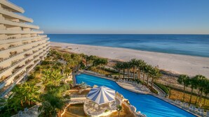 A resort with a large pool, beach access, and a multi-story building. - Gulf Front Condo with Stunning Views! (Pensacola)