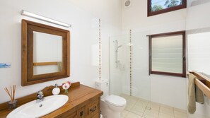 Bathtub, hair dryer, towels, soap