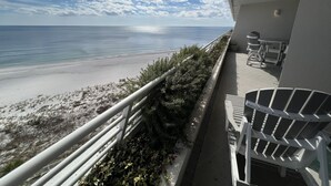 A balcony with a view of the beach and ocean. - Gulf Front Condo with Stunning Views! (Pensacola)