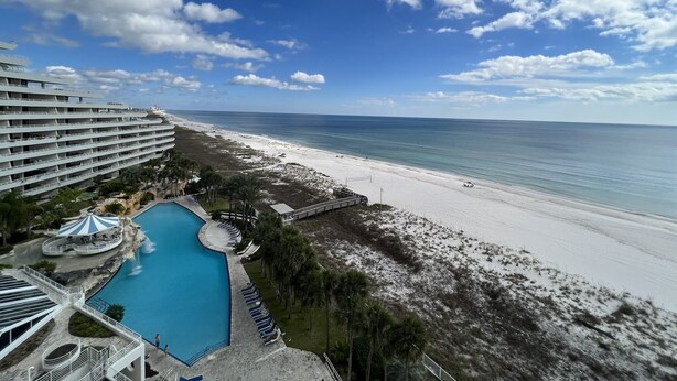 A resort with a large pool, beach, and ocean view. - Gulf Front Condo with Stunning Views! (Pensacola)