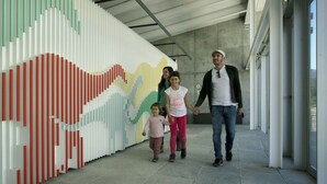 A modern building with a unique wall art installation. - Charming house located in the Espinalbet area. (Castellar del Riu)
