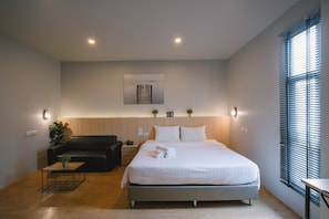 Exclusive-Doppel- oder -Zweibettzimmer, 1 Schlafzimmer | Schreibtisch, Verdunkelungsvorhänge, kostenloses WLAN, Bettwäsche