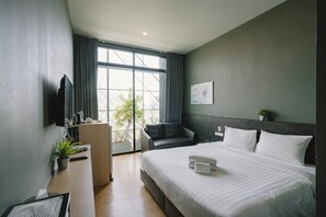 Deluxe Studio Suite, 1 Bedroom, Non Smoking | Desk, blackout drapes, free WiFi, bed sheets - The Arbern Hostel x Bistro (Phuket)