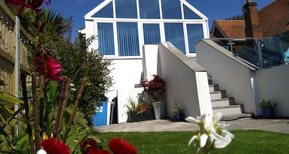 Modern apartment on Sandbanks Peninsula, with private garden. (pet friendly)