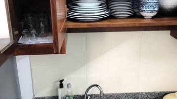 Fridge, microwave, stovetop, cookware/dishes/utensils