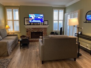 Smart TV, fireplace, DVD player, books