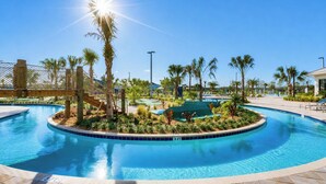 A clear blue pool with a 3 FT depth marker, surrounded by palm trees and a wooden deck. - Family Fun: Condo near Theme Parks & Pools! (Kissimmee)