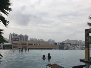 4 outdoor pools, pool umbrellas, pool loungers - Sunrise City Alm's Luxury Apartment (Ho Chi Minh City)