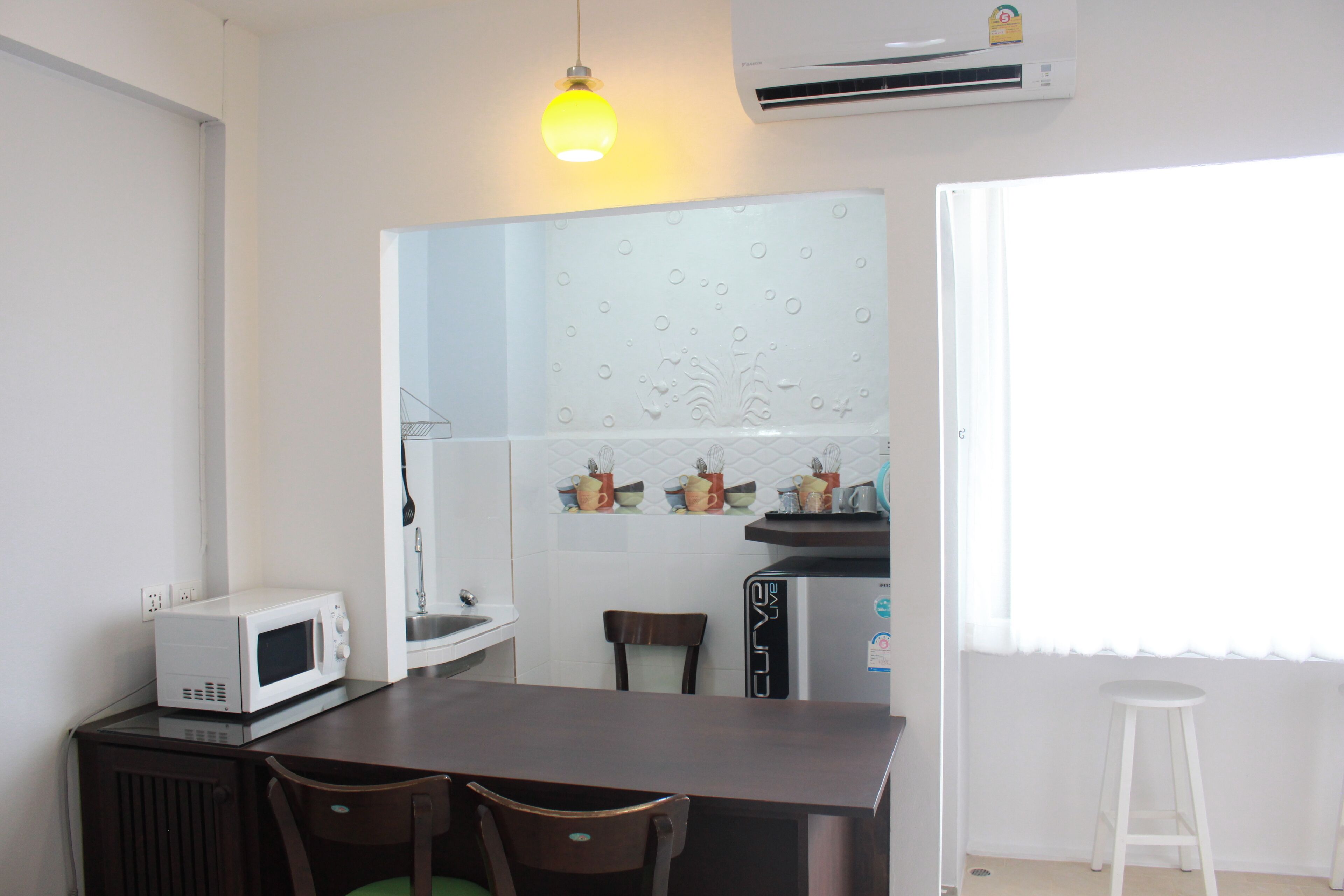 studio suite | private kitchen | fridge, electric kettle