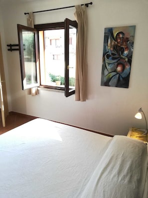 2 habitaciones y ropa de cama