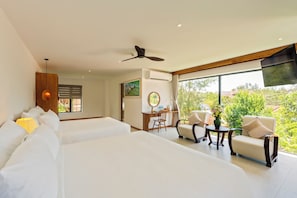 Family Room, Pool View | 1 bedroom, minibar, in-room safe, desk