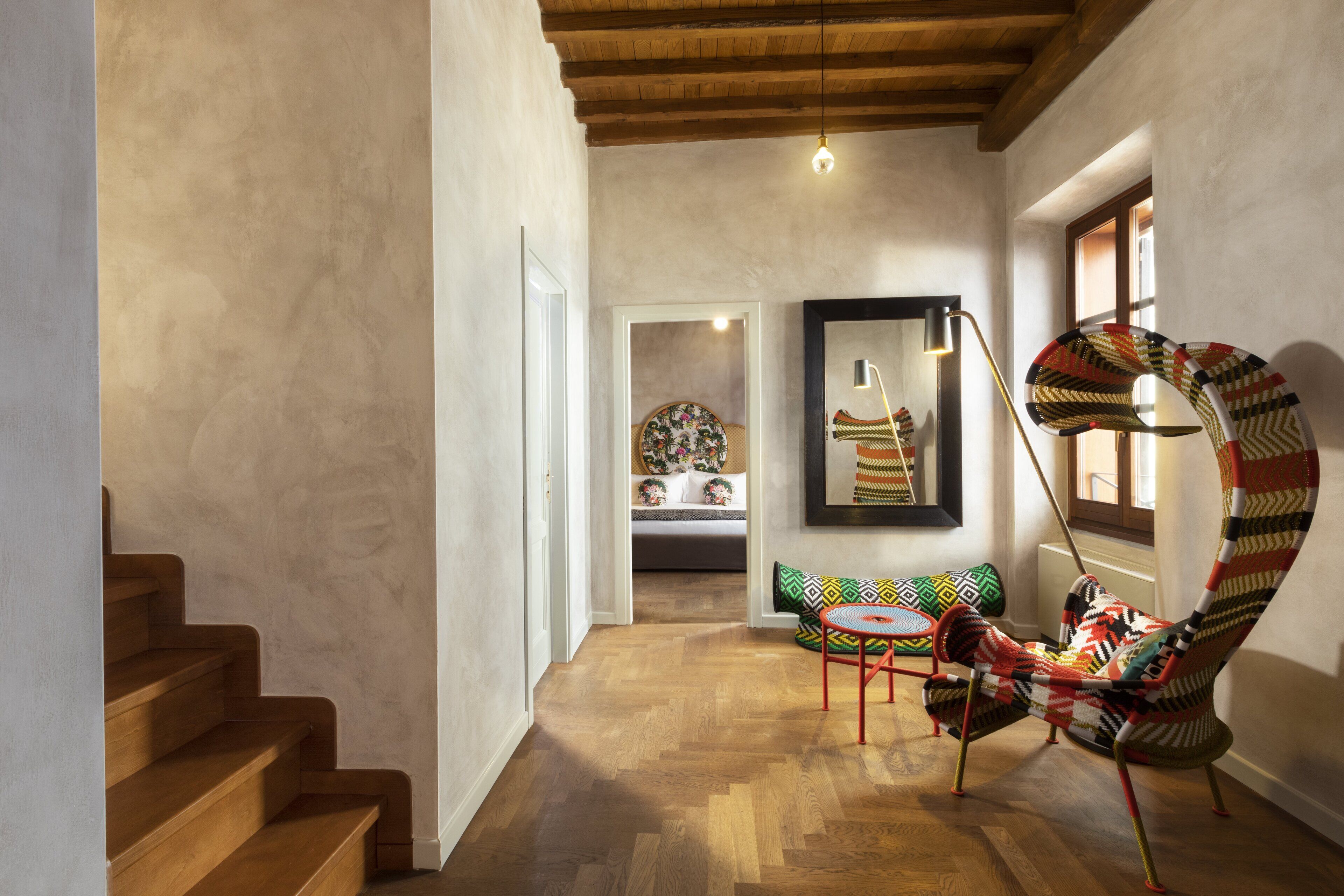 Family Suite, 2 Bedrooms, Courtyard View | Free minibar items, in-room safe, individually decorated