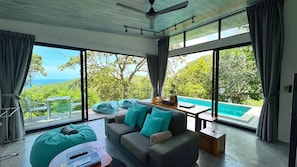 Villa Turquoise Surf (1-Bedroom Pool Villa) | Living area | 48-inch flat-screen TV with digital channels, Smart TV, Netflix
