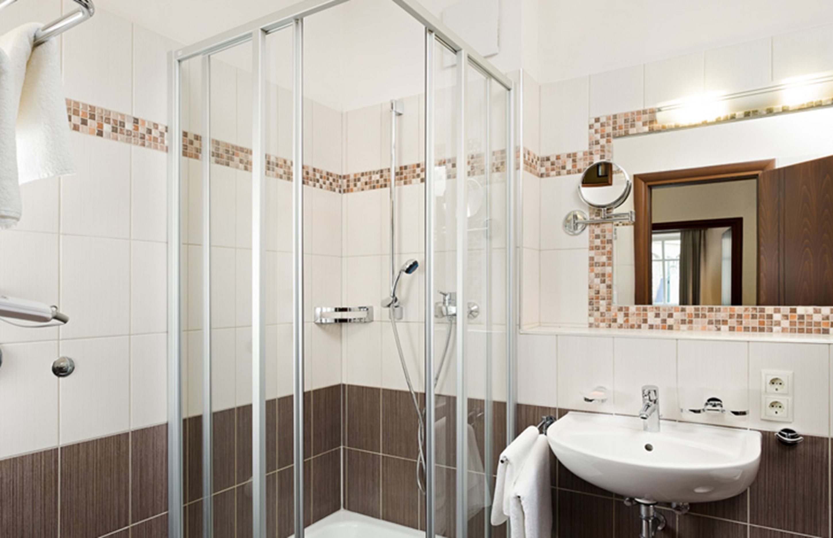 shower, free toiletries, hair dryer, towels