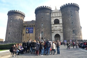 A historic castle with two prominent towers and a central entrance. - Smiling Naples (Naples)