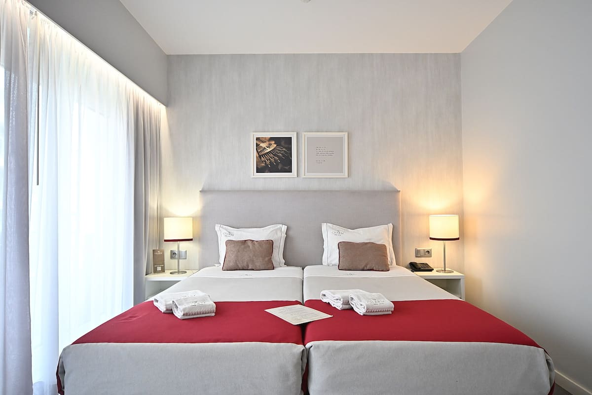 Standard Double or Twin Room | 1 bedroom, in-room safe, blackout drapes, soundproofing