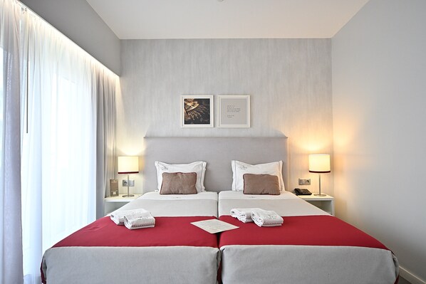 Standard Double or Twin Room | 1 bedroom, in-room safe, blackout drapes, soundproofing