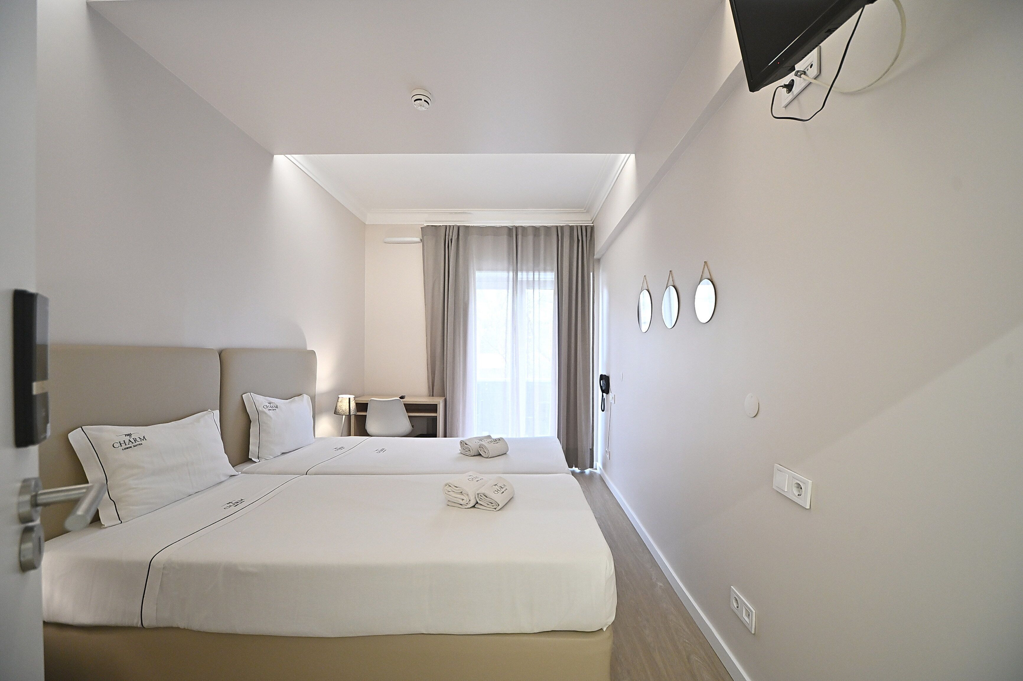 Twin Room, Shared Bathroom | 1 bedroom, in-room safe, blackout curtains, soundproofing