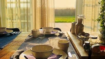 Daily local cuisine breakfast (EUR 14.75 per person)