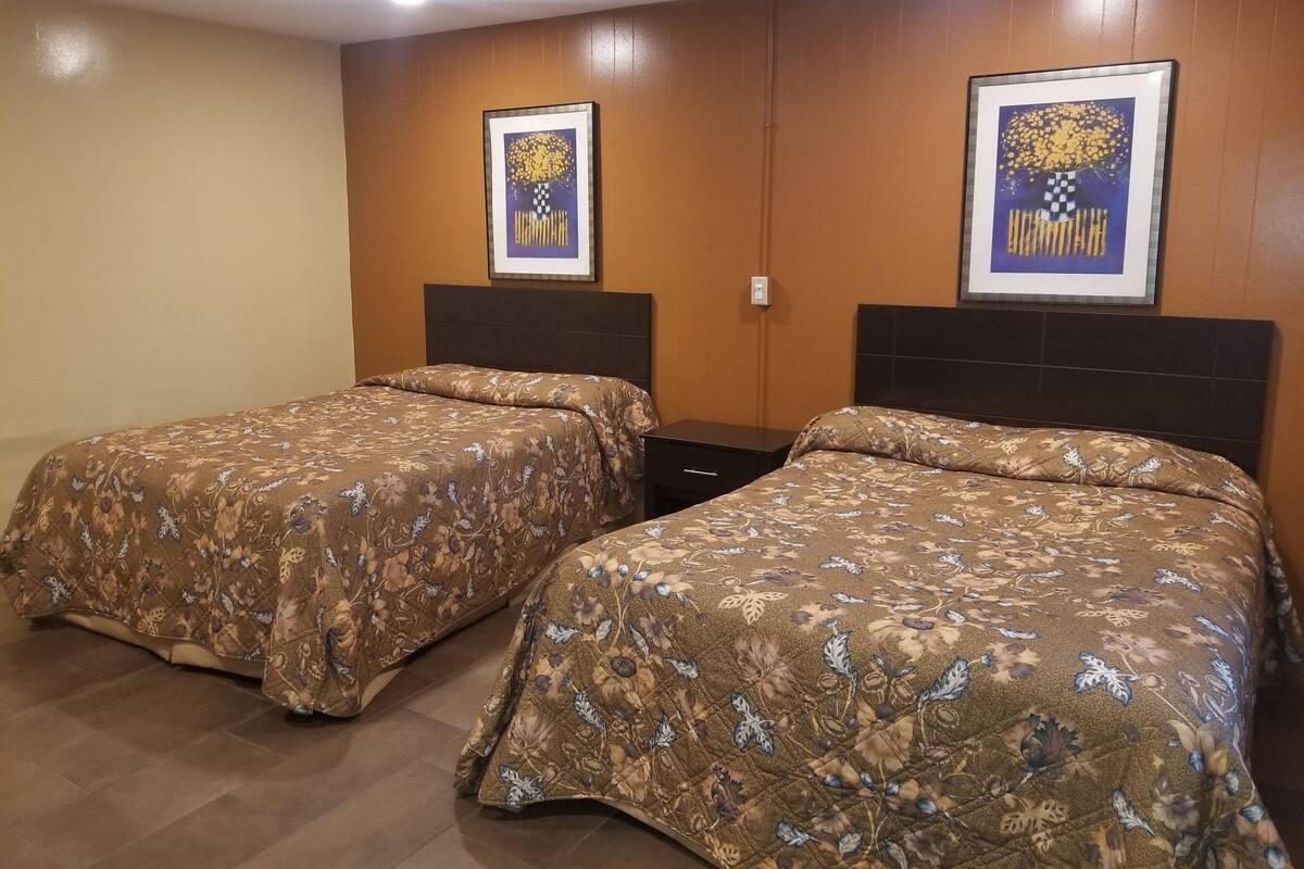 Desk, blackout drapes, WiFi (free), bed sheets