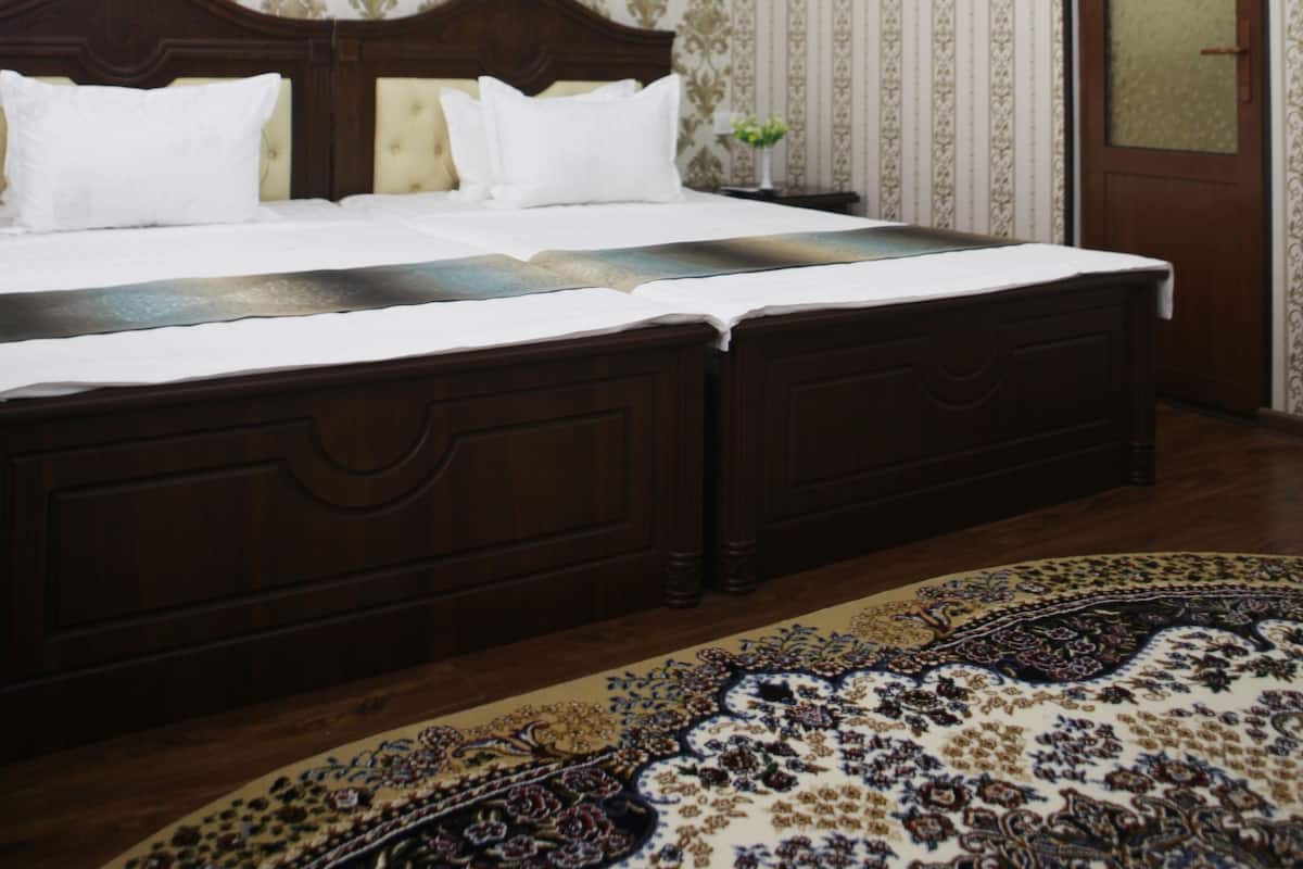 Standard Double Room | Minibar, in-room safe, desk, blackout drapes