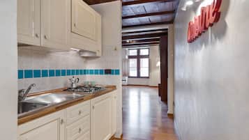 Apartamento, 1 quarto | Cozinha privada | Geladeira, cooktop, cafeteira/chaleira, chaleira elétrica