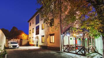 Exclusive Apartment | Front of property – evening/night