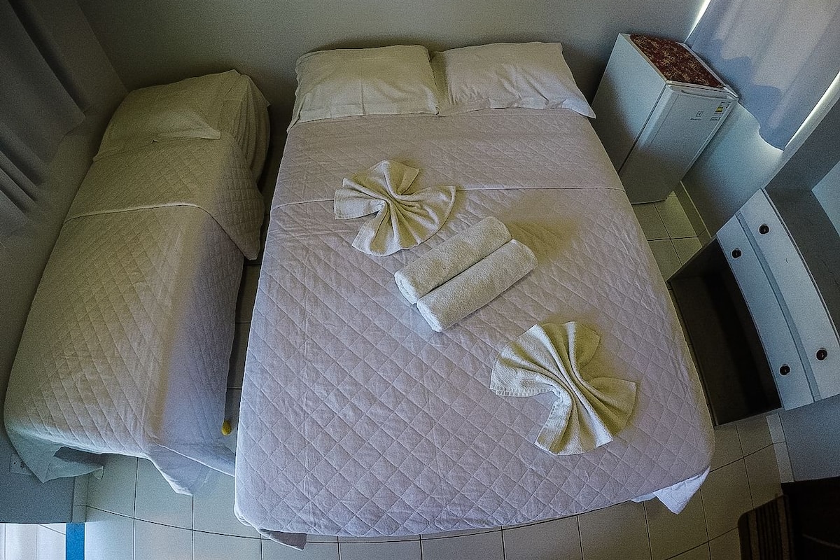 Triple Room | Minibar, blackout curtains, free WiFi, bed sheets