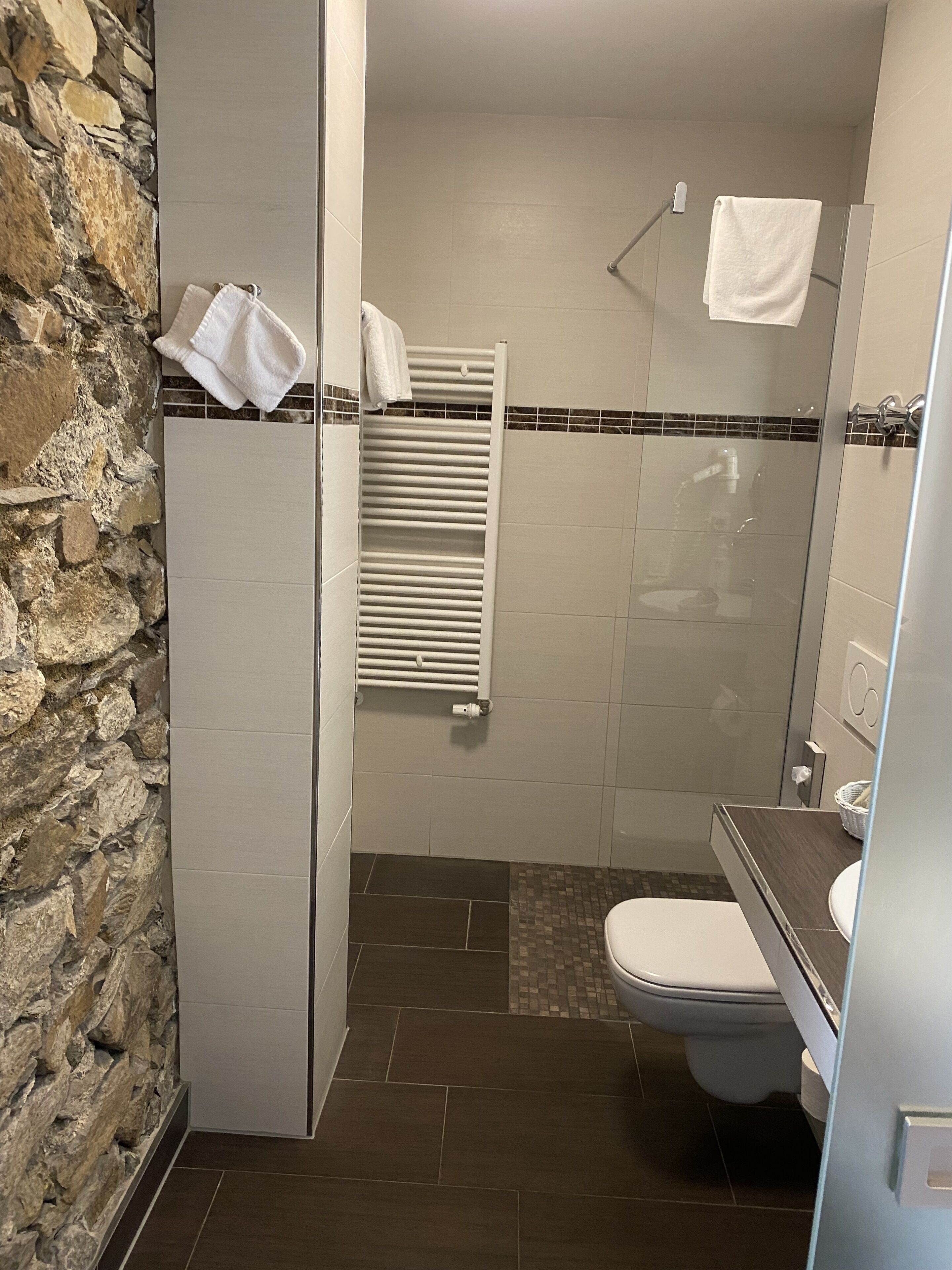 comfort double room (heuscheuer) | bathroom | shower, free toiletries, hair dryer, slippers