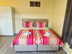 Blackout drapes, soundproofing, free WiFi, bed sheets